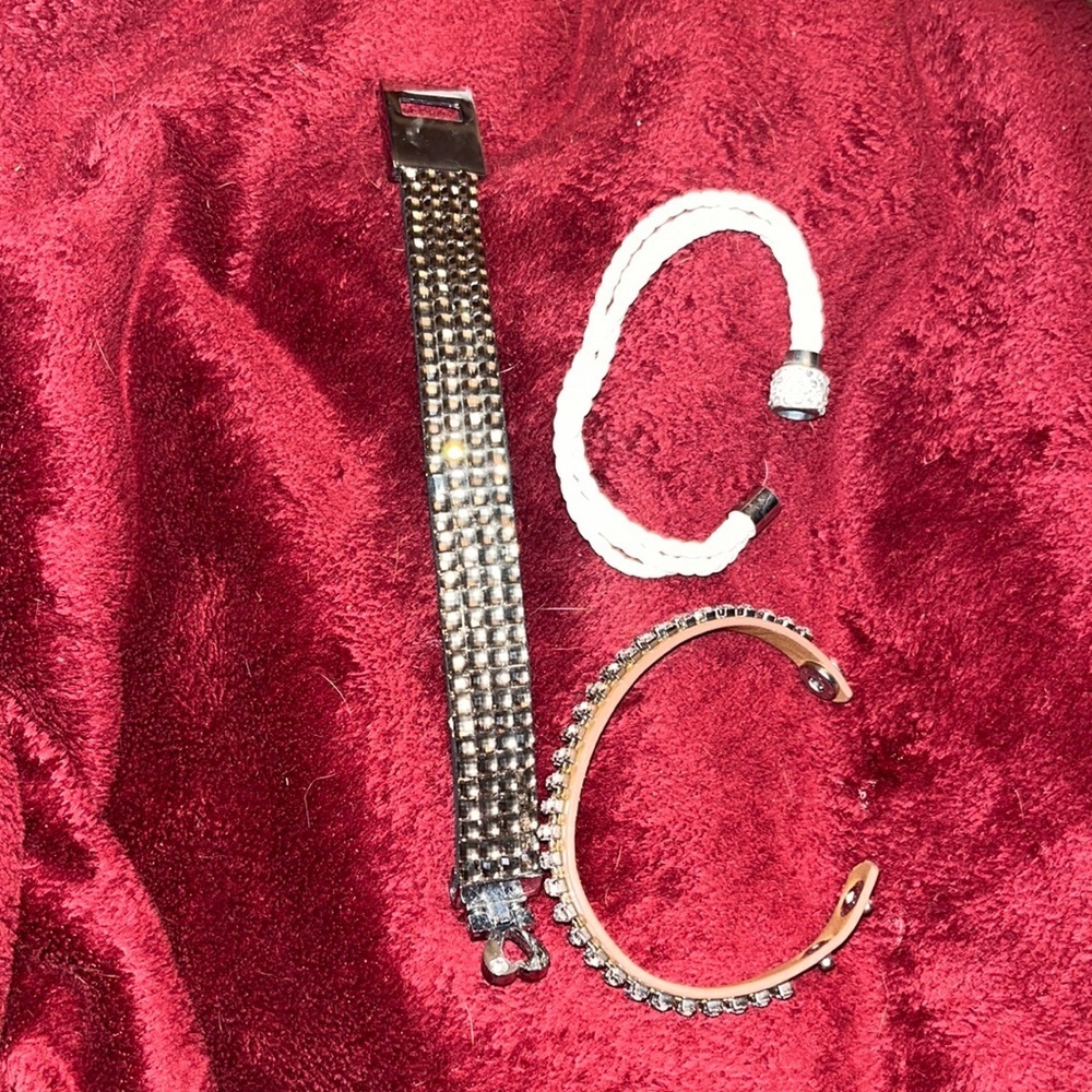 Leather  bracelets w/ rhinestones 1 magnetic, 1 adjustable snap, I ornate…